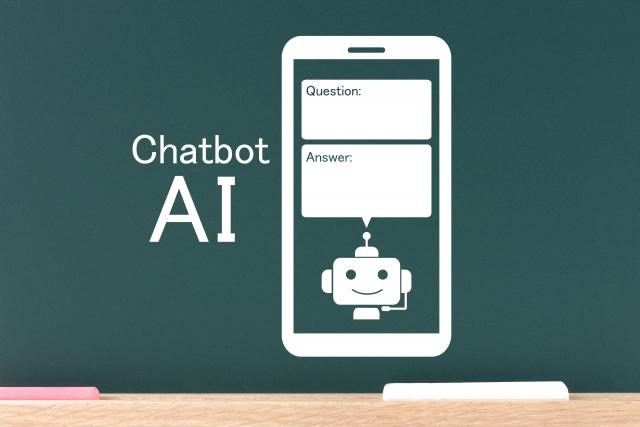 黒板に描かれたスマートフォンのチャットボット